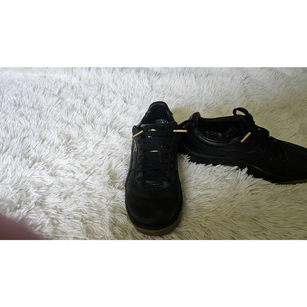 PUMA Unisex-Child Gv Special Sneaker, Black and Gold, size 5.5Y